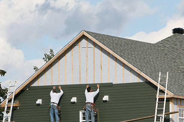 Professional Siding Installation technician working in Havre de Grace, MD